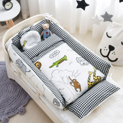 ensemble-reducteur-de-lit-bebe-cocon-de-sommeil
