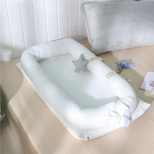 reducteur-de-lit-cocon-bebe-pliable